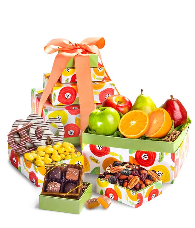 Springtime Gift Tower: Includes Green D'Anjou Pear, Red D'Anjou Pear, Navel Orange, Braeburn Apple, Granny Smith Apple, Gourmet Brownies, Cherry Berry Trail Mix, Lemon Cr&egrave;me Almonds, and Milk &amp; Dark Chocolate Sea Salt Caramels.