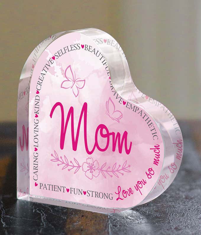 Pink acrylic heart with message 'Mom, love you so much' - a heartfelt keepsake for Mother's Day.