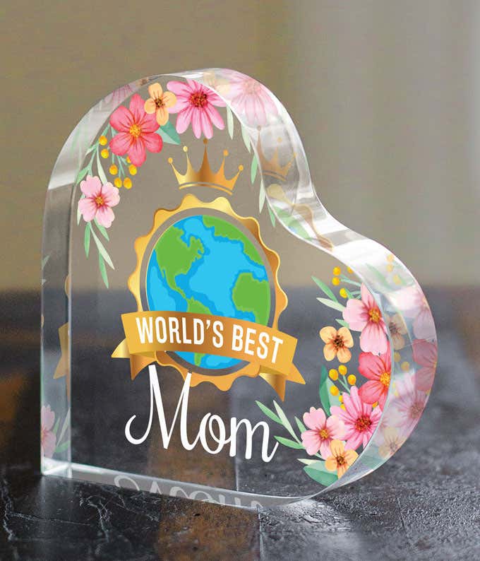 Image: An acrylic heart with a World Illustration and Pink Floral Design, perfect for Mother's Day. Presented in a gift box with personalization option.