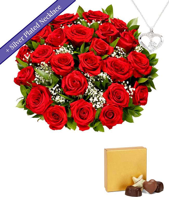 Partial image of Two dozen red roses with a silver heart necklace on a chain and a small box of assorted chocolates without vase.